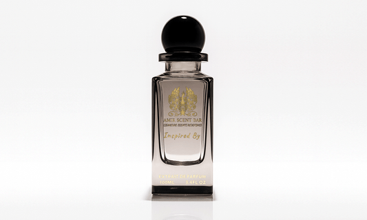 Amir Scent Bar perfume bottle with a black cap and gold lettering