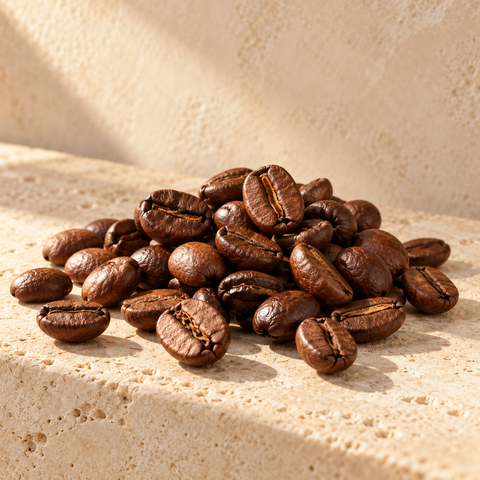 roasted coffee beans with a few split beans